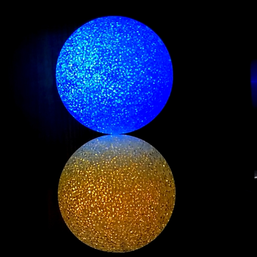 A set of 6 in color changing LED ball lights